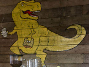 Dinosaur mural at Brickwood Coffee